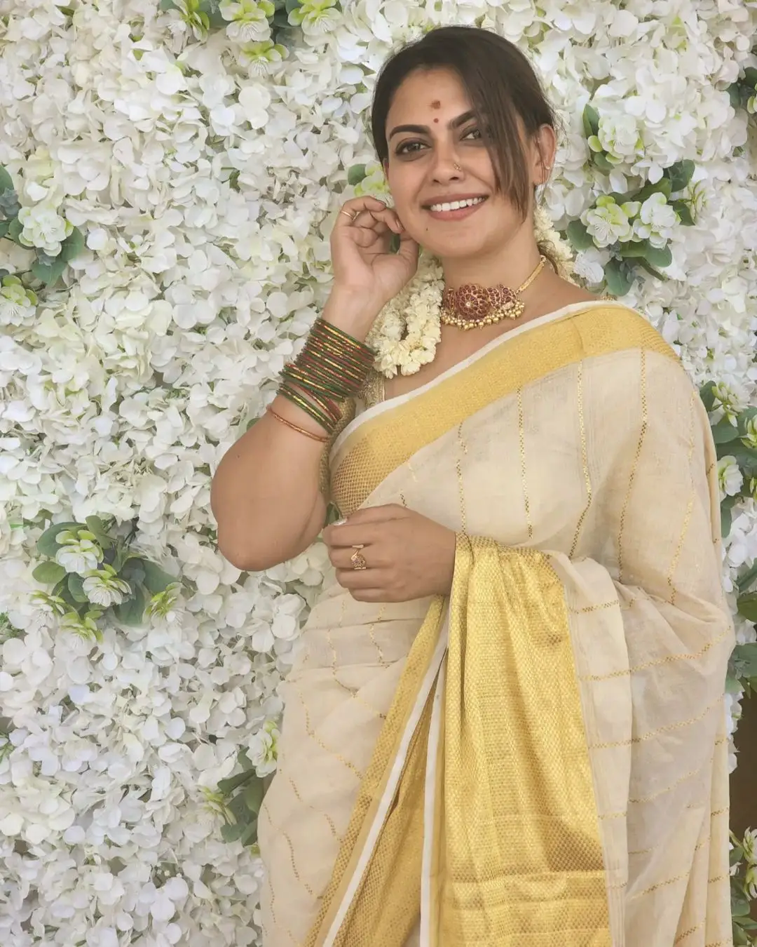 Anusree Nair Wearing Beautiful Earrings Jewellery White Pattu Saree